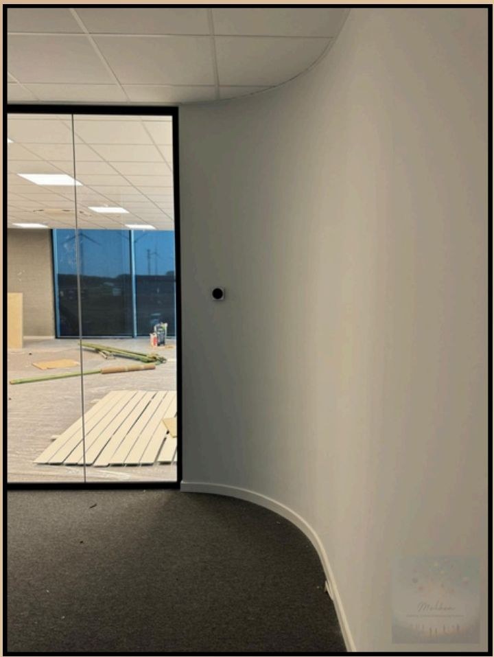 Office hallway with curved wall, Belgium